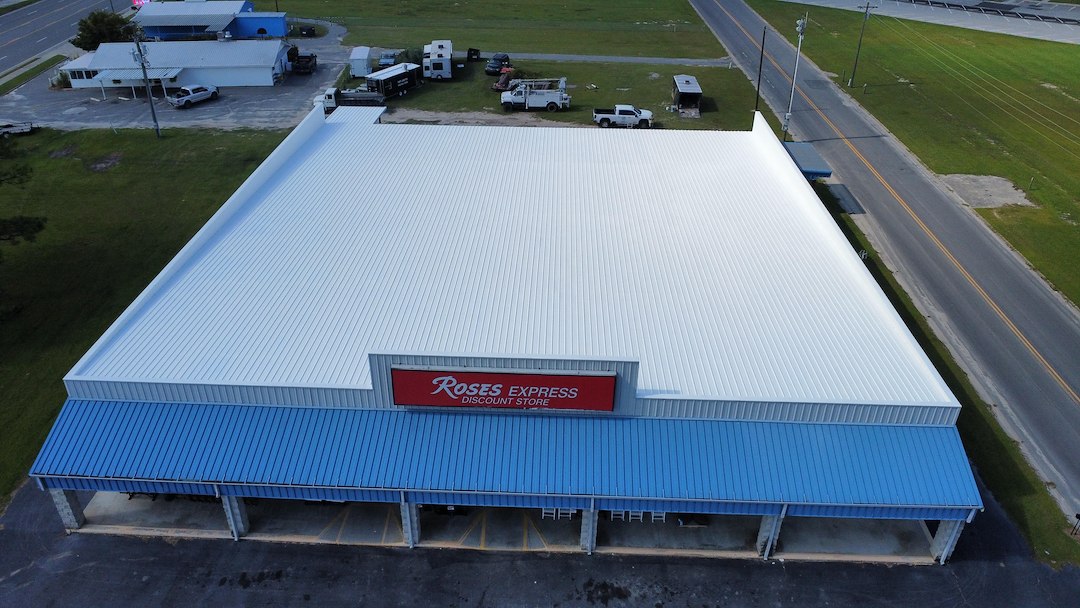 10-Year Uniflex Acrylic Waterproof System over the metal roof at Roses in Alma, GA